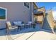 Cozy outdoor patio seating area with modern furniture, perfect for relaxation and entertaining at 17341 Red Cosmos Pt, Parker, CO 80134