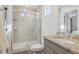 Bathroom with large glass door shower and vanity with beautiful granite countertop at 18372 E 100Th Pl, Commerce City, CO 80022
