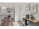 Eat-in kitchen featuring stainless steel appliances, sleek countertops, and ample cabinet space at 18372 E 100Th Pl, Commerce City, CO 80022