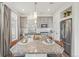 Modern kitchen with gray cabinets and granite island at 18372 E 100Th Pl, Commerce City, CO 80022