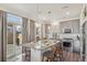 Bright kitchen with gray cabinets, stainless steel appliances, and granite countertops at 18372 E 100Th Pl, Commerce City, CO 80022