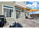 View of a cozy patio and grill, perfect for backyard barbecues at 18372 E 100Th Pl, Commerce City, CO 80022