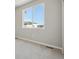 Well-lit bedroom with neutral walls and carpet flooring, offering a peaceful atmosphere at 461 Interlocken Blvd # 102, Broomfield, CO 80021