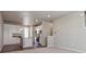 Modern kitchen with white cabinets and a large island at 461 Interlocken Blvd # 102, Broomfield, CO 80021