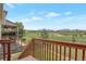 Relaxing backyard with wooden deck, fenced yard, and views of the neighborhood at 3223 Castle Peak Ave, Superior, CO 80027