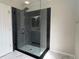 Contemporary bathroom with a luxurious glass-enclosed shower and elegant finishes at 3223 Castle Peak Ave, Superior, CO 80027