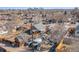 Neighborhood aerial shot featuring city skyline and cluttered backyard at 47 Osceola St, Denver, CO 80219
