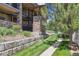 Multi-story condo with brick facade and well-maintained landscaping at 875 E 78Th Ave # 7, Denver, CO 80229