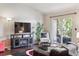 Comfortable living room with balcony access and modern decor at 875 E 78Th Ave # 7, Denver, CO 80229