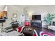 Spacious living room open to kitchen, hardwood floors, and modern style at 875 E 78Th Ave # 7, Denver, CO 80229