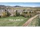 Aerial view of 4346 S. Quail St. showcasing the property, landscaping, and surroundings at 4346 S Quail St, Littleton, CO 80127