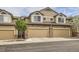 Charming townhome featuring a stone facade and two-car garage at 4346 S Quail St, Littleton, CO 80127
