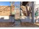 Exterior view featuring a secured outdoor gate and stairs, adding to the property's safety and privacy at 1310 N Corona St # A, Denver, CO 80218