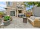 A lovely backyard featuring a jacuzzi, outdoor furniture, and an outdoor tv at 240 S Oak Hill St, Aurora, CO 80018