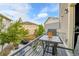 Charming balcony with seating, overlooking a well-maintained backyard at 240 S Oak Hill St, Aurora, CO 80018