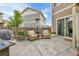 Relaxing backyard features patio furniture and landscaping at 240 S Oak Hill St, Aurora, CO 80018