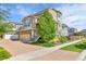 Charming home with a brick driveway and manicured landscaping at 240 S Oak Hill St, Aurora, CO 80018
