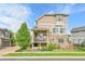 Beautifully landscaped exterior elevation with inviting balcony at 240 S Oak Hill St, Aurora, CO 80018