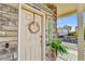 Inviting front entrance featuring a wreath and stone accents at 240 S Oak Hill St, Aurora, CO 80018