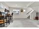 Spacious living room featuring an office space and staircase at 240 S Oak Hill St, Aurora, CO 80018