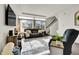 Inviting living room with a comfortable sofa, natural light, and modern decor, creating a cozy atmosphere at 240 S Oak Hill St, Aurora, CO 80018