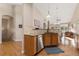 Modern kitchen with granite countertops, stainless steel appliances, and hardwood floors at 6606 S Reed Way # B, Littleton, CO 80123