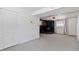 Bright basement bedroom with mirrored closet doors and neutral decor at 995 S Upham St, Lakewood, CO 80226