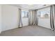 Bright and airy basement bedroom with window and neutral decor at 995 S Upham St, Lakewood, CO 80226