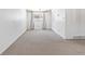 Simple basement bedroom with neutral walls and carpet flooring at 995 S Upham St, Lakewood, CO 80226