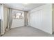 Spacious basement bedroom with double door closet and window at 995 S Upham St, Lakewood, CO 80226