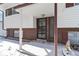 Covered entryway with brick facade and decorative iron door at 995 S Upham St, Lakewood, CO 80226