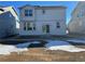 Two story home with backyard and partial snow cover at 191 Freemont Ct, Brighton, CO 80601