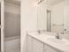 Bathroom with double sinks and a shower/tub combo at 10767 Mountshire Cir, Highlands Ranch, CO 80126