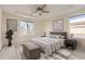 Bright bedroom with a king-size bed and large windows at 10767 Mountshire Cir, Highlands Ranch, CO 80126