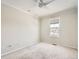 Bedroom with window, ceiling fan, and carpet at 10767 Mountshire Cir, Highlands Ranch, CO 80126