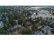 An aerial of a neighborhood featuring homes surrounded by mature trees at 8140 Lightening View Dr, Parker, CO 80134