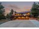 Charming multi-level home with attached three car garage and spacious wooden deck at 8140 Lightening View Dr, Parker, CO 80134