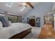 Spacious main bedroom with vaulted ceilings, skylights, and a view into the hallway at 8140 Lightening View Dr, Parker, CO 80134
