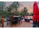 Inviting outdoor patio with fire pit, comfortable seating, and scenic views at 8140 Lightening View Dr, Parker, CO 80134