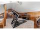 Attic work out space with treadmill, elliptical, mounted bar for drinks and walk out porch at 8140 Lightening View Dr, Parker, CO 80134
