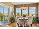 Bright dining area with mountain views and access to the outside patio at 12121 Bryant St, Westminster, CO 80234