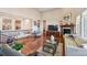 Comfortable living room with hardwood floors, fireplace, and lots of natural light at 12121 Bryant St, Westminster, CO 80234