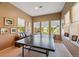 Bright recreation room featuring multiple windows and a ping pong table for entertainment at 12121 Bryant St, Westminster, CO 80234