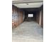 The unfinished garage interior features a window at 7620 Kearney Dr, Commerce City, CO 80022