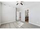 Comfortable bedroom with carpet, ceiling fan, and an ensuite bathroom at 9465 Yampa St, Commerce City, CO 80022