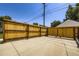 Spacious backyard area with wood fence and concrete pad at 2634 S Humboldt St, Denver, CO 80210