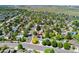 Enjoy a peaceful neighborhood with this home featuring solar panels and mature trees around at 1606 S Flanders Way, Aurora, CO 80017