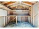 Interior view of a shed with shelving and ample space for storage and projects at 1606 S Flanders Way, Aurora, CO 80017