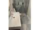 Modern bathroom features marble tiling, sleek vanity, and glass shower enclosure at 8747 Mesquite Row, Lone Tree, CO 80124