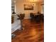 Dining area adjacent to the kitchen with modern lighting and bar seating at 8747 Mesquite Row, Lone Tree, CO 80124